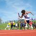 Pioneer's Cole Taylor races down the track during the second heat of the boy's 4 by 200 relay event at the Golden Triangle boys and girls track meet at Saline High School, Friday, May 3.
Courtney Sacco I AnnArbor.com